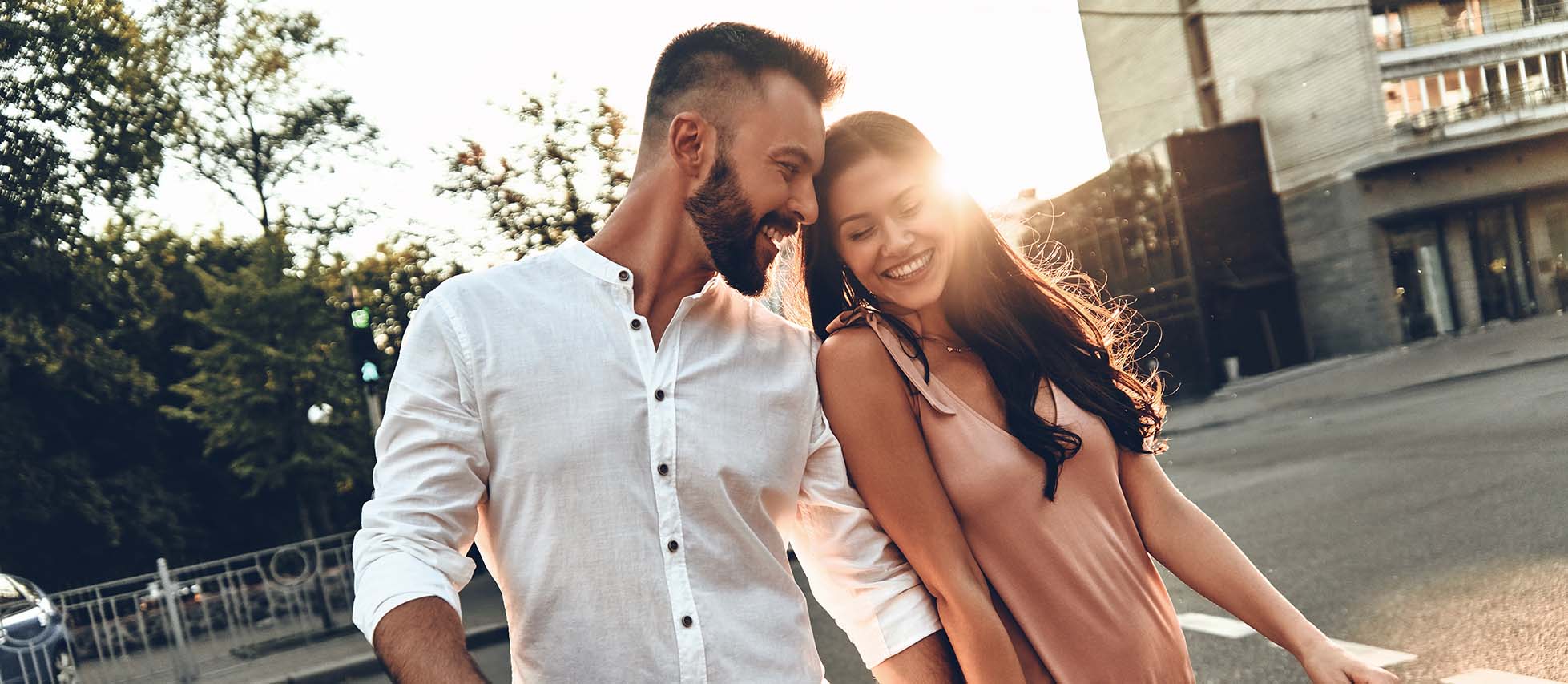 Man and woman walking together holding hands