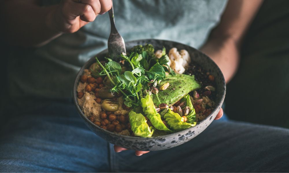 man eating healthy food to support testosterone treatment