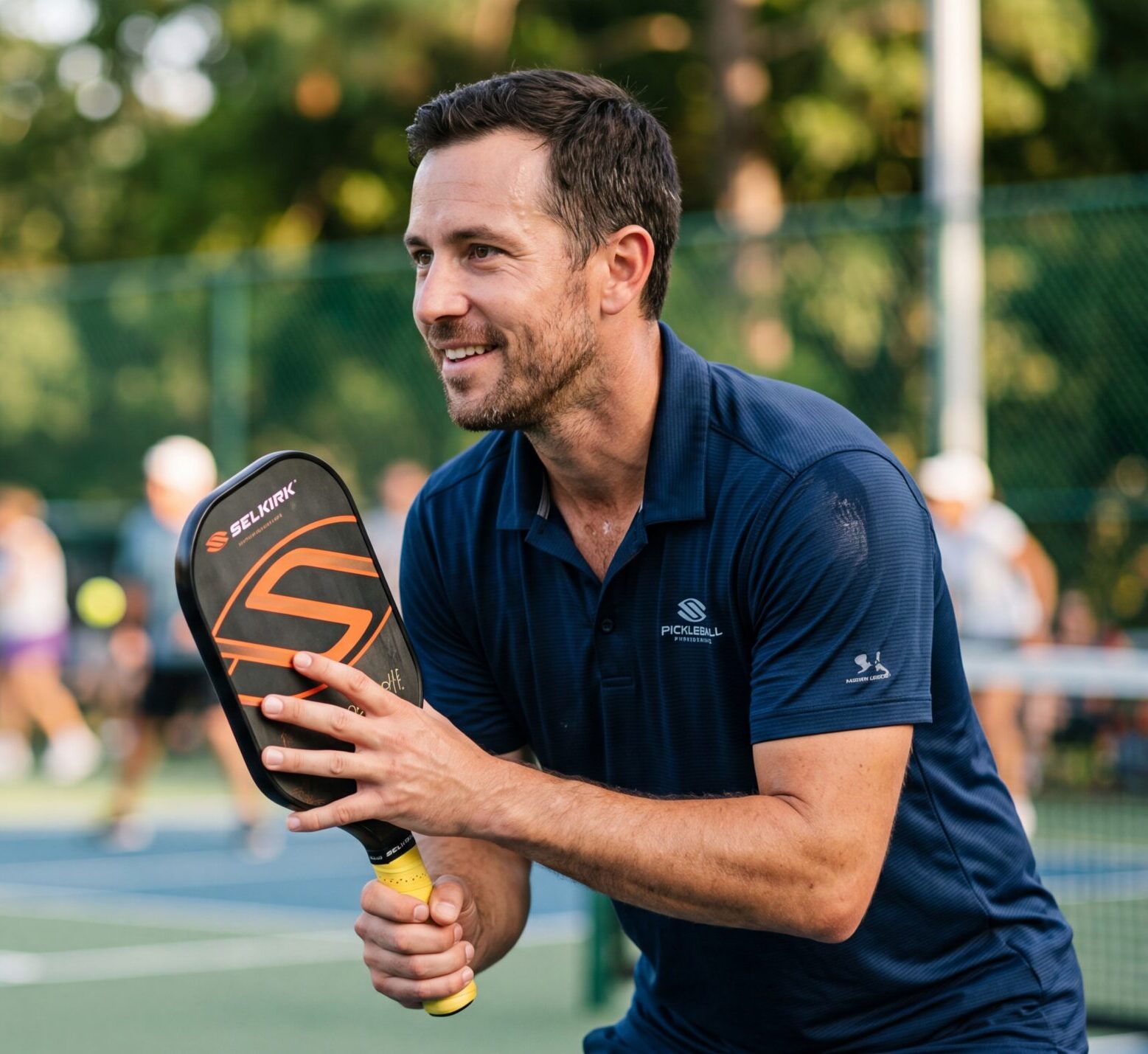 Man playing pickleball outdoors